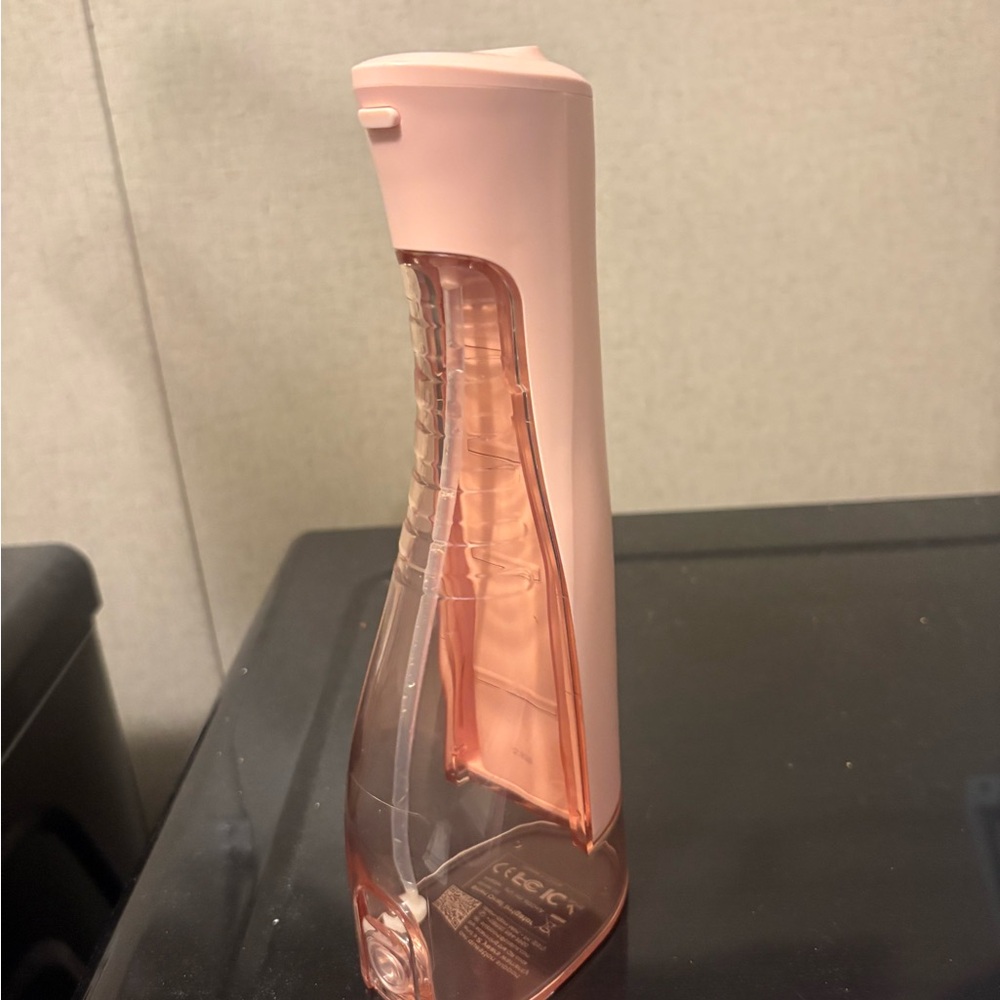 Coslus Pink dental flosser